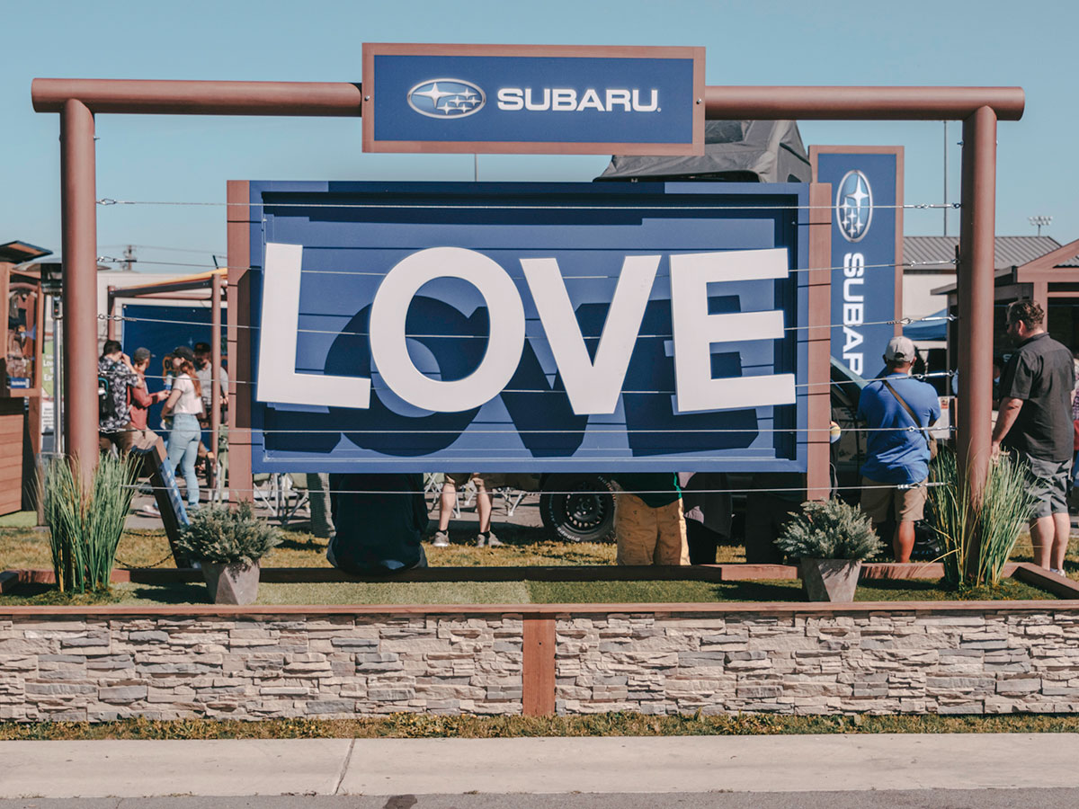 Subaru LOVE dimensional signage installation at an outdoor festival