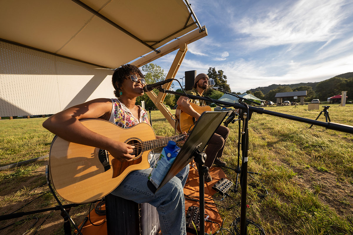 Live acoustic music performance at Basecamp