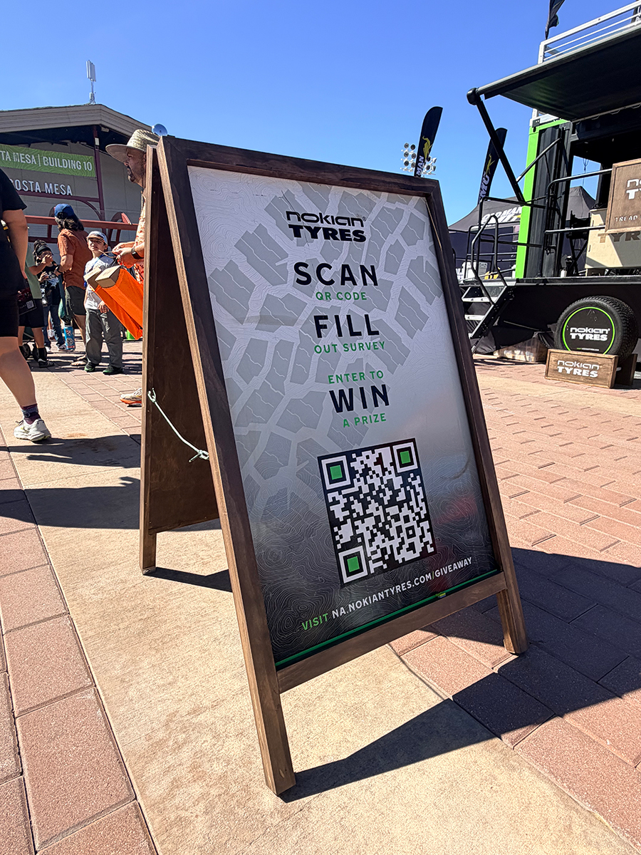 Nokian Tyres Scan-Fill-Win survey signage at the activation