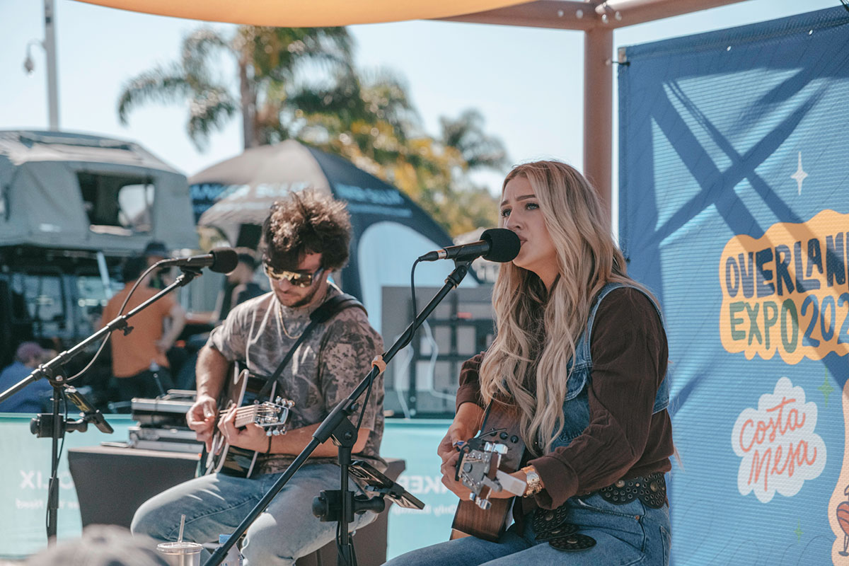 Live acoustic performance on the Overland Expo stage