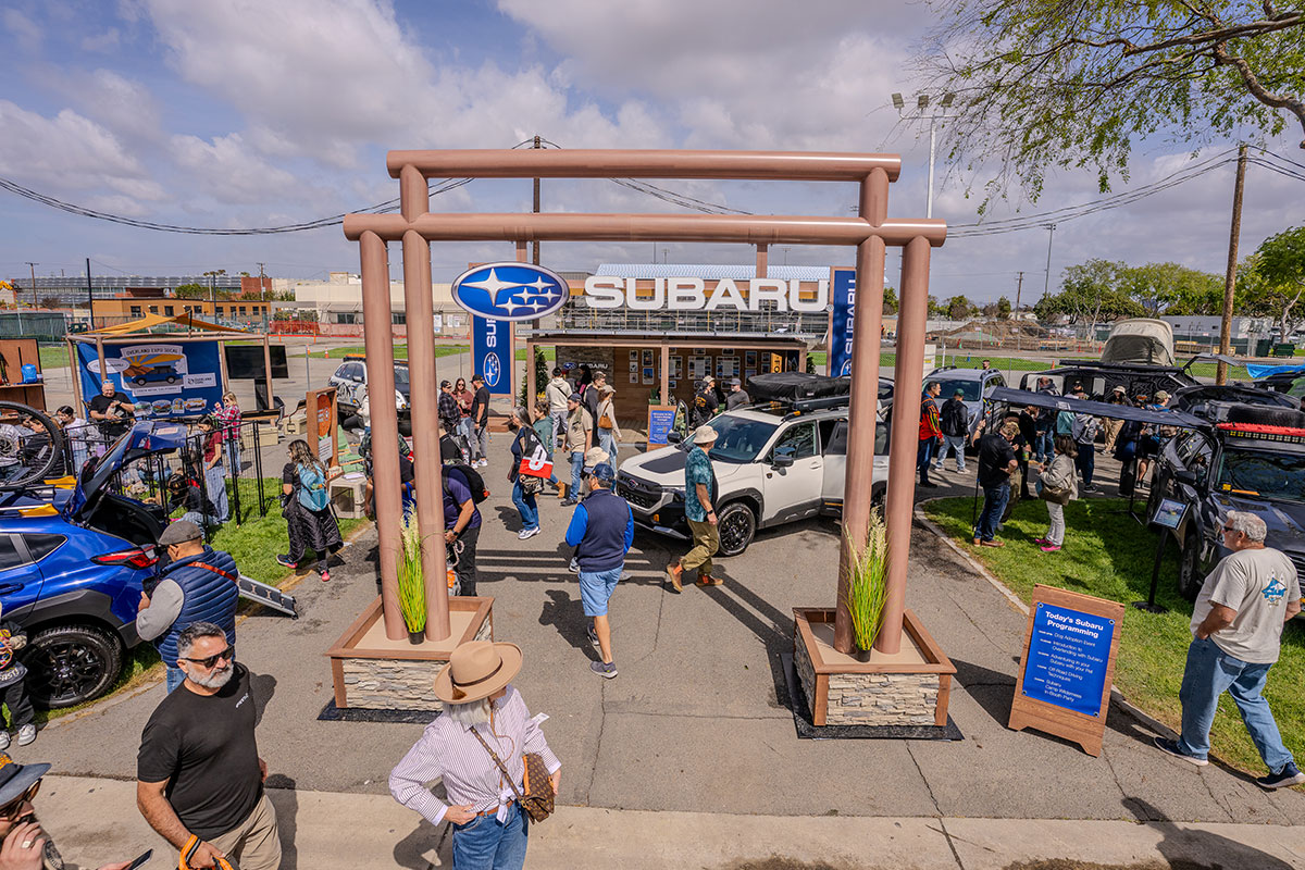 Subaru Overland Expo entrance with crowd and Wilderness vehicles