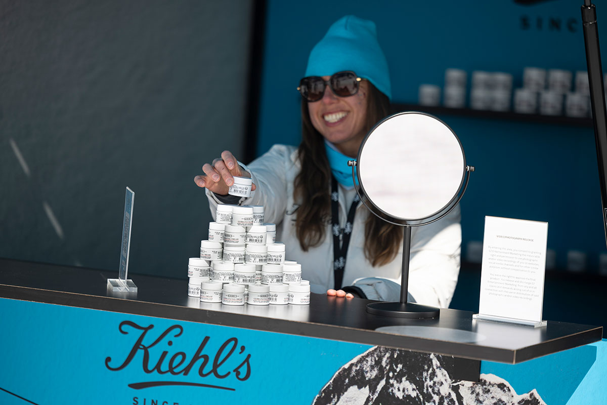 Brand ambassador handing out Kiehl's product samples