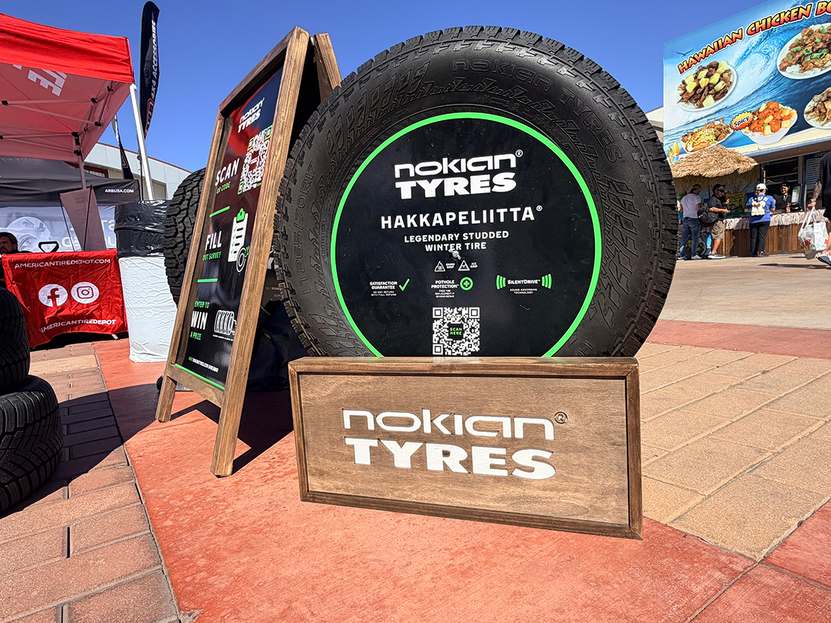 Oversized Nokian Hakkapeliitta tire display with QR signage