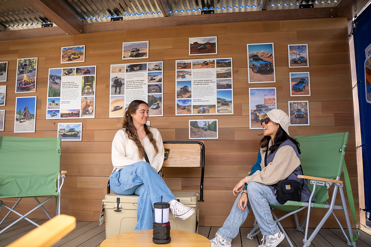 Owners lounge with Subaru community photo wall