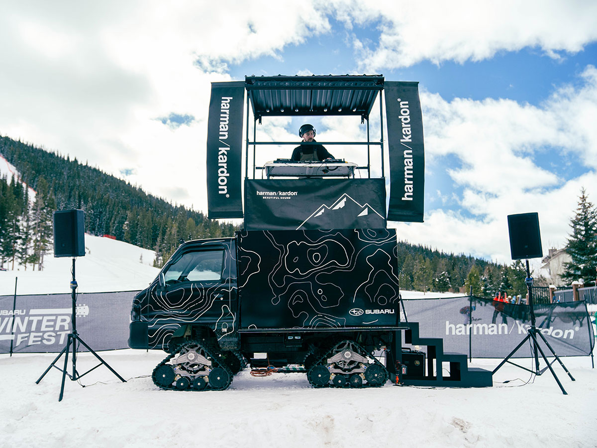 Harman Kardon x Subaru mobile tracked DJ stage at Winterfest